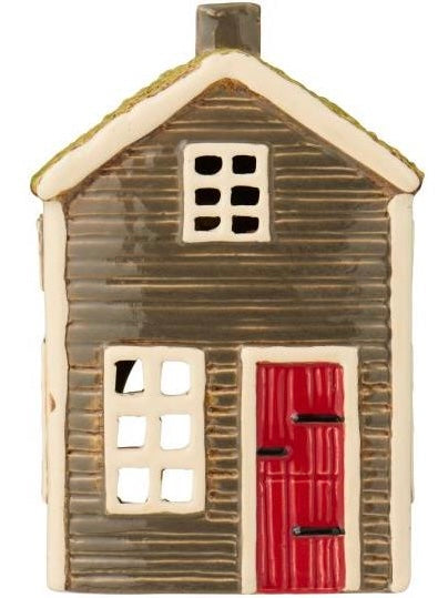 Haus für Teelicht Visby, braun mit roter Tür und Gras auf dem Dach