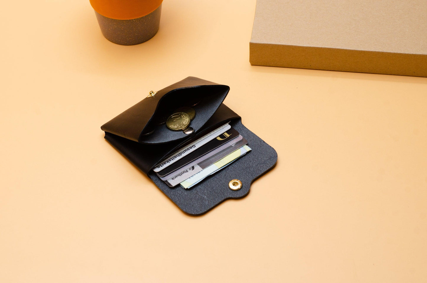 Minimalistischer Geldbeutel aus Leder, Schwarz